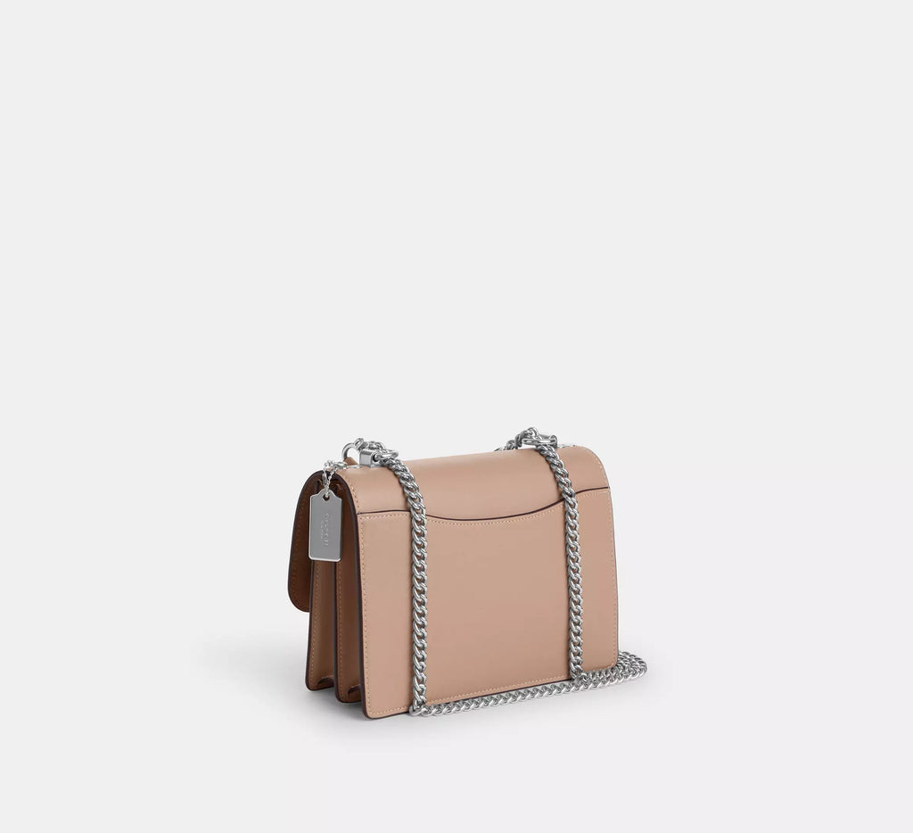 Klare Crossbody Bag In Signature Canvas - Sand/Taupe