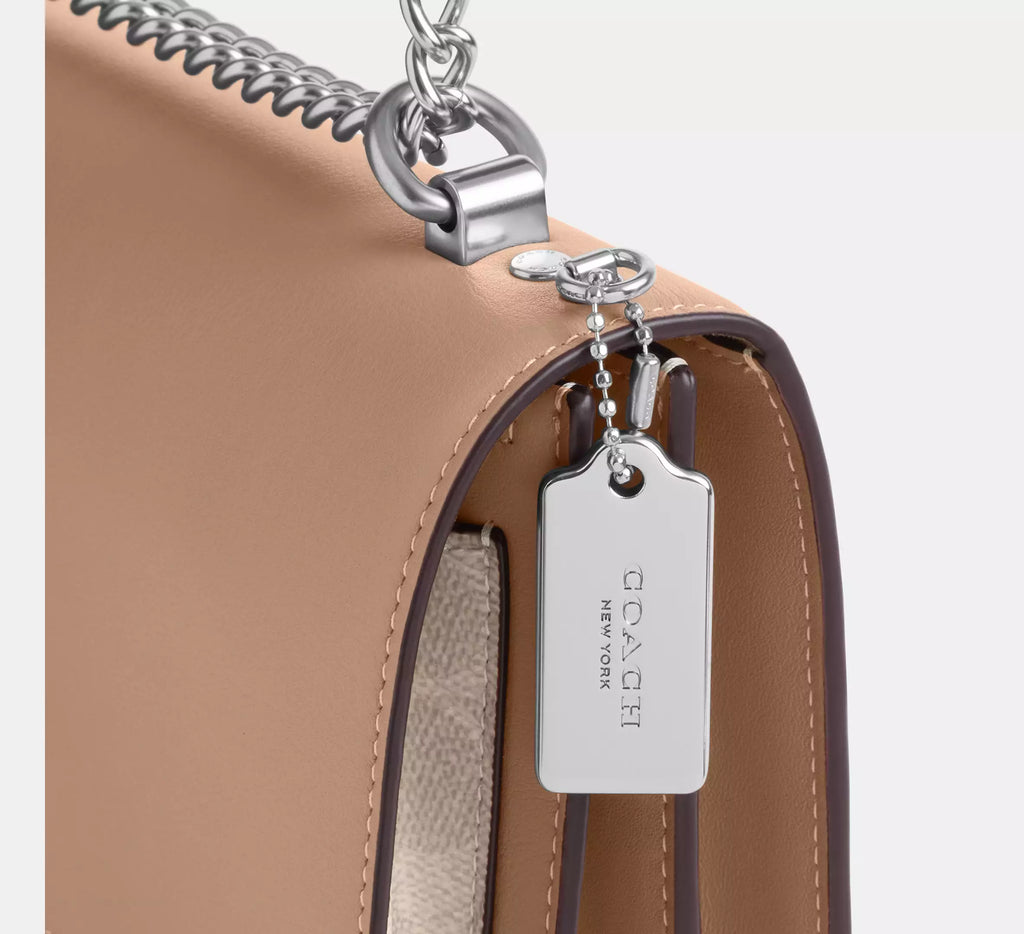 Klare Crossbody Bag In Signature Canvas - Sand/Taupe